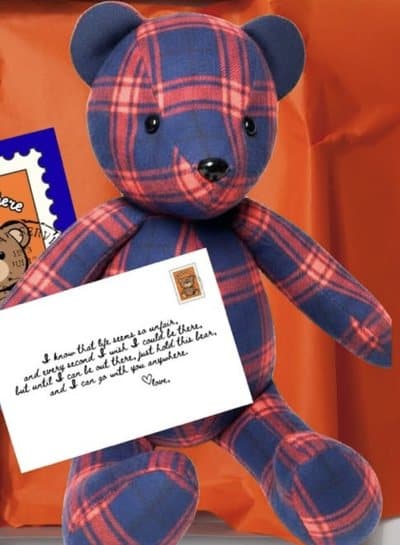 A plaid bear sewn from a flannel shirt
